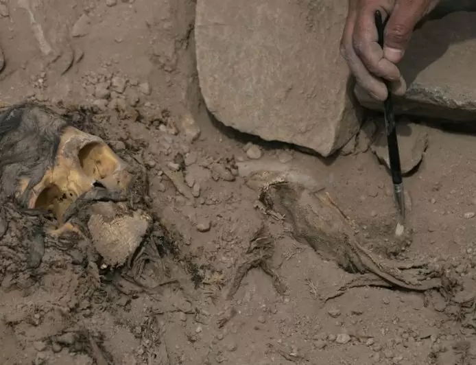 Archaeologists find buried mummy next to soccer field in Peru
