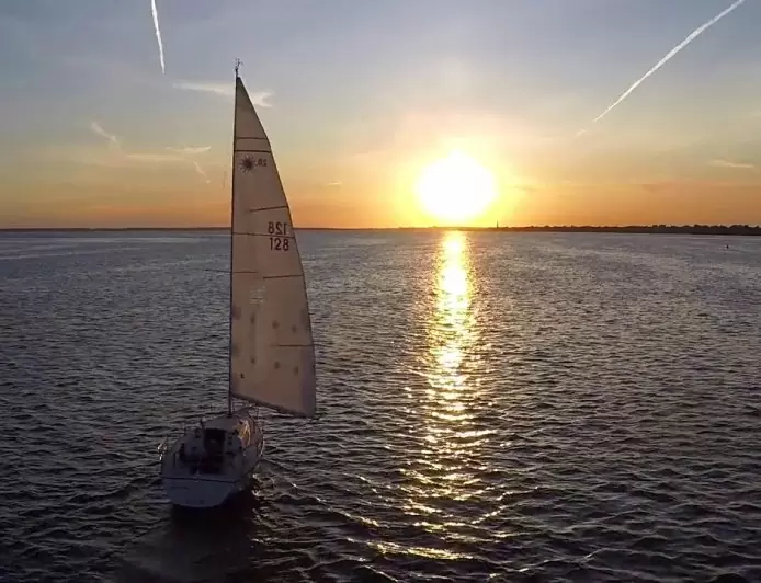 Sailboat sailing during sunset